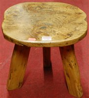 Lot 1286 - A rustic elm shaped top milking stool, dia. 31....