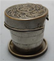 Lot 491 - A metal pocket spirit cup with concertina action