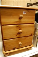 Lot 1289 - A modern pine round cornered three drawer...