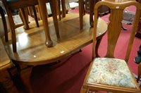 Lot 1339 - A 1920s oak D-end extending dining table,...