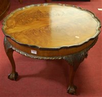 Lot 1351 - A 1930s walnut piecrust topped circular low...