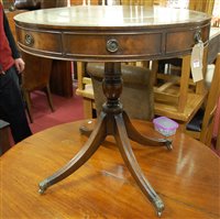 Lot 1368 - A Regency style mahogany and gilt tooled green...