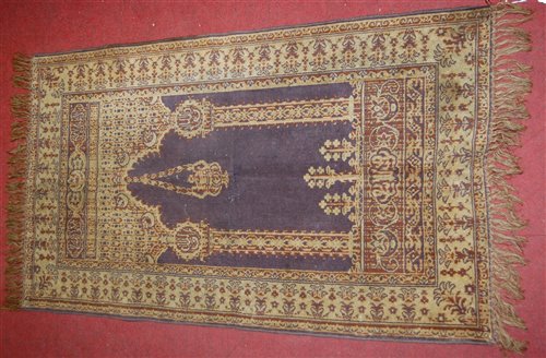 Lot 162 - A woven silk prayer rug, 107 x 63cm