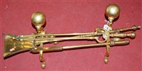 Lot 166 - Three turned fire brass fire tools to include...