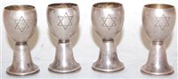 Lot 540 - A set of four early 20th century white metal...