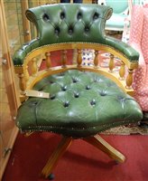 Lot 1402 - A reproduction beech, green leather buttoned...