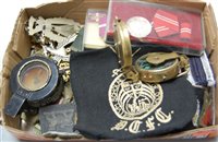 Lot 552 - A box of miscellaneous militaria, to include...