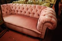 Lot 1417 - A Victorian pink buttonback upholstered three...