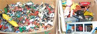 Lot 629 - Two boxes of mixed playworn toys and diecast...