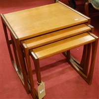 Lot 1437 - A 1970s Nathan teak nest of three occasional...