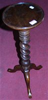 Lot 1442 - An early 20th century walnut spiral turned...