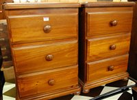 Lot 1446 - A pair of pine round cornered three drawer...