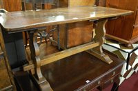 Lot 1449 - A joined oak plank top rectangular coffee...