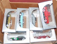 Lot 674 - Six cased Signature Models diecast vehicles