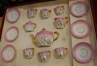 Lot 691 - A cased Continental childs porcelain tea service