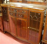 Lot 1464 - A 1920s mahogany and flame mahogany ledgeback...