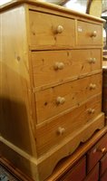 Lot 1469 - A modern pine round cornered chest of two...