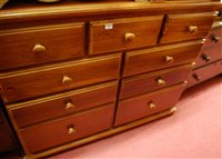 Lot 1470 - A modern stained pine round cornered side...