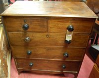 Lot 1472 - A mid-19th century mahogany chest of two short...