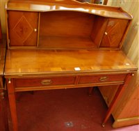 Lot 1491 - A reproduction yew wood bonheur du jour, the...