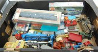 Lot 721 - A box of loose and cased diecast and tinplate...