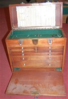 Lot 745 - A mid-20th century fallfront collectors chest,...