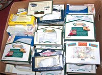 Lot 765 - Two boxes of various cased diecast vehicles by...