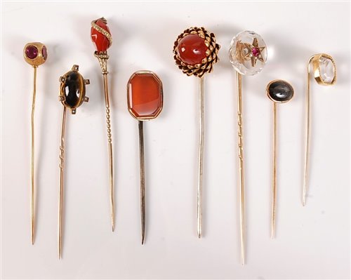 Lot 2552 - Eight gemset stick pins: a rock crystal with...