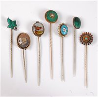 Lot 2558 - Eight various stick pins: to include a reverse...