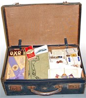 Lot 512 - A small leather suitcase and contents, to...