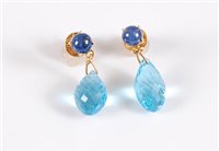 Lot 2735 - A pair of topaz and sapphire earrings, the...