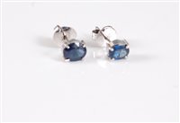 Lot 2633 - A pair of sapphire earstuds, the oval faceted...