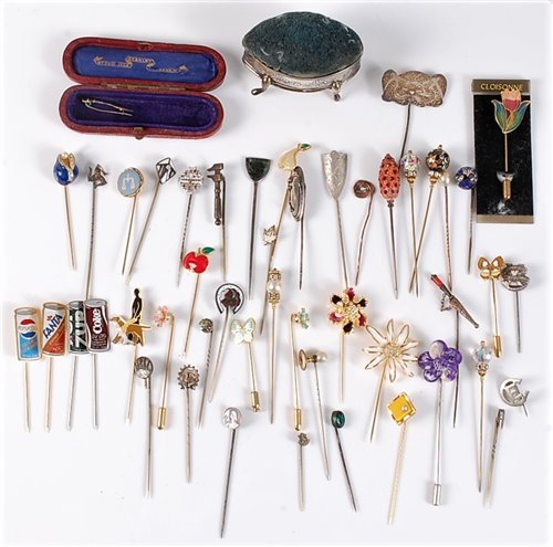 Lot 2564 - A group of assorted stick pins: to include...