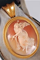 Lot 1232 - An Etruscan revival carved cameo...