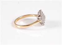 Lot 2647 - An 18ct diamond cluster ring, the round...