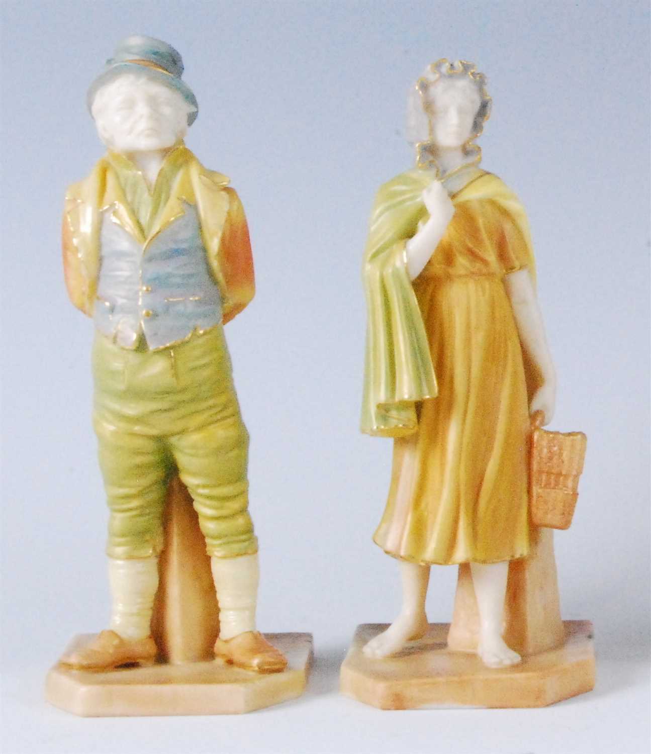 Lot 1093 - A pair of Worcester shot enamel figures...