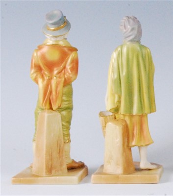Lot 1093 - A pair of Worcester shot enamel figures...