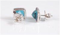 Lot 1324 - A pair of 18ct white gold *blue topaz* and...