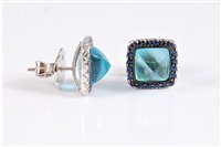 Lot 1324 - A pair of 18ct white gold *blue topaz* and...