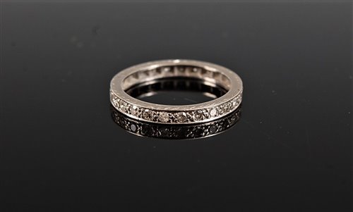 Lot 2599 - A diamond eternity ring, the round brilliant...