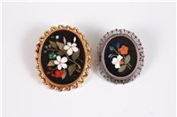 Lot 2586 - Two pietra dura brooches, the first oval...