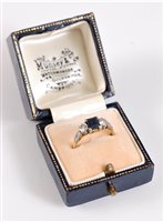 Lot 2660 - An 18ct sapphire and diamond ring, the square...