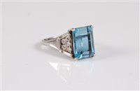 Lot 1241 - An aquamarine and diamond ring, the step cut...