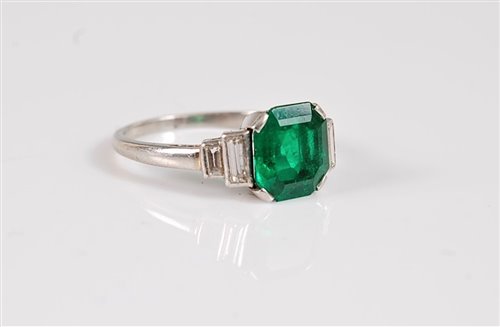Lot 1258 - An emerald and diamond ring, the octagonal...