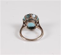 Lot 1293 - An 18ct aquamarine single stone ring, the...