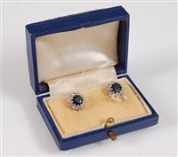 Lot 1247 - A pair of 9ct sapphire and diamond earrings,...