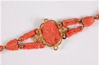 Lot 1267 - A 19th century carved coral cameo bracelet,...