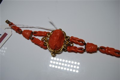 Lot 1267 - A 19th century carved coral cameo bracelet,...