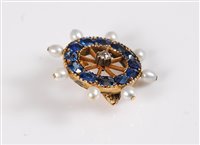 Lot 1228 - A sapphire, diamond and 'pearl' Captains wheel...