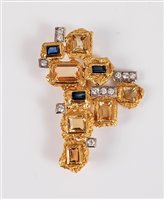 Lot 264 - A gemset pendant/brooch by Charles de Temple,...